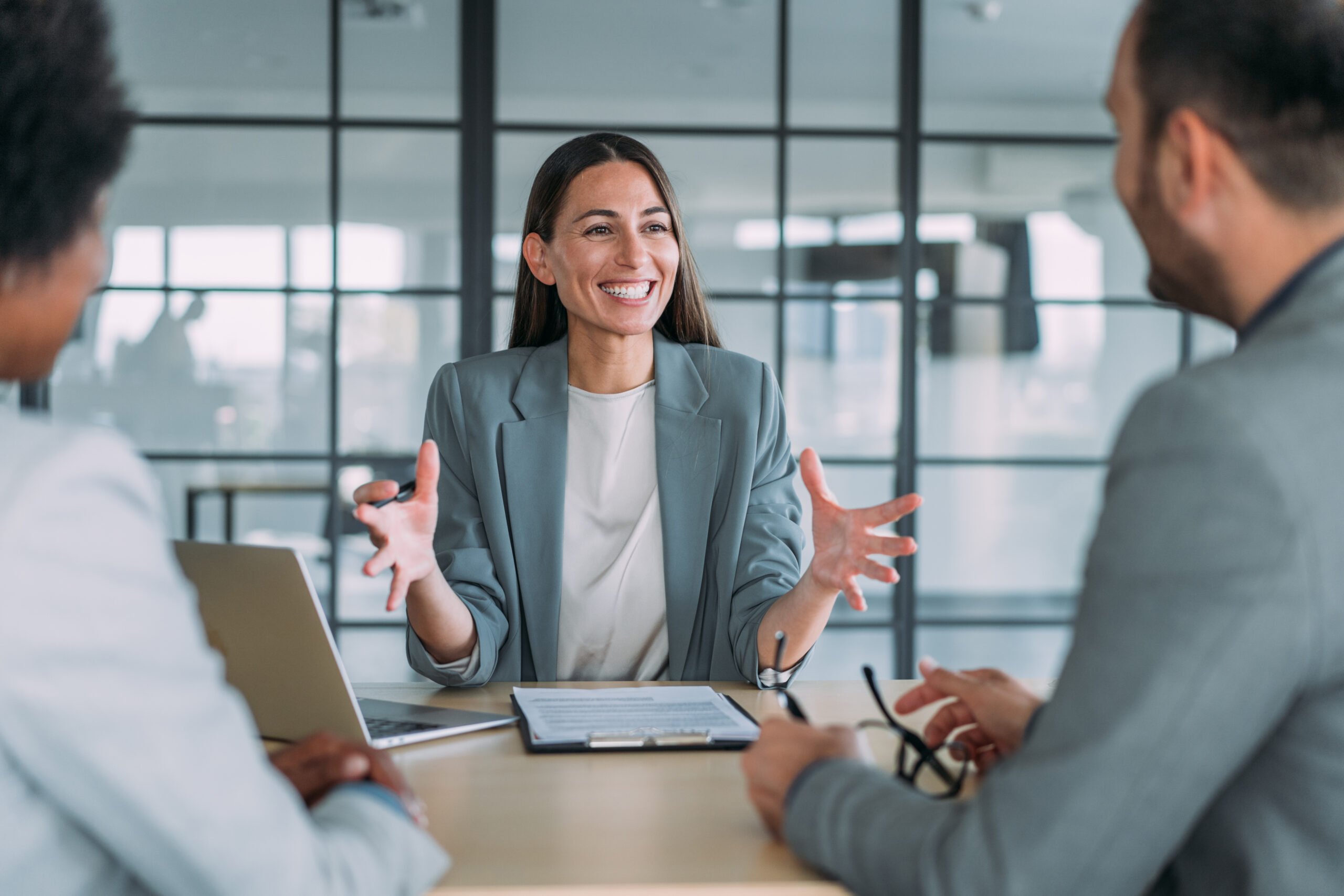 A customer service manager talking politely with her customers