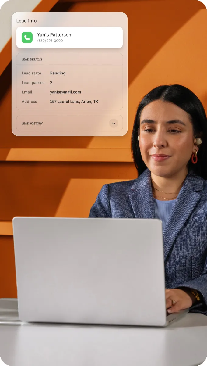 A female employee using her laptop to switch from chat to video call