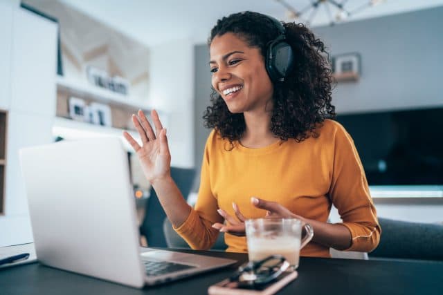 Happy employee working from home