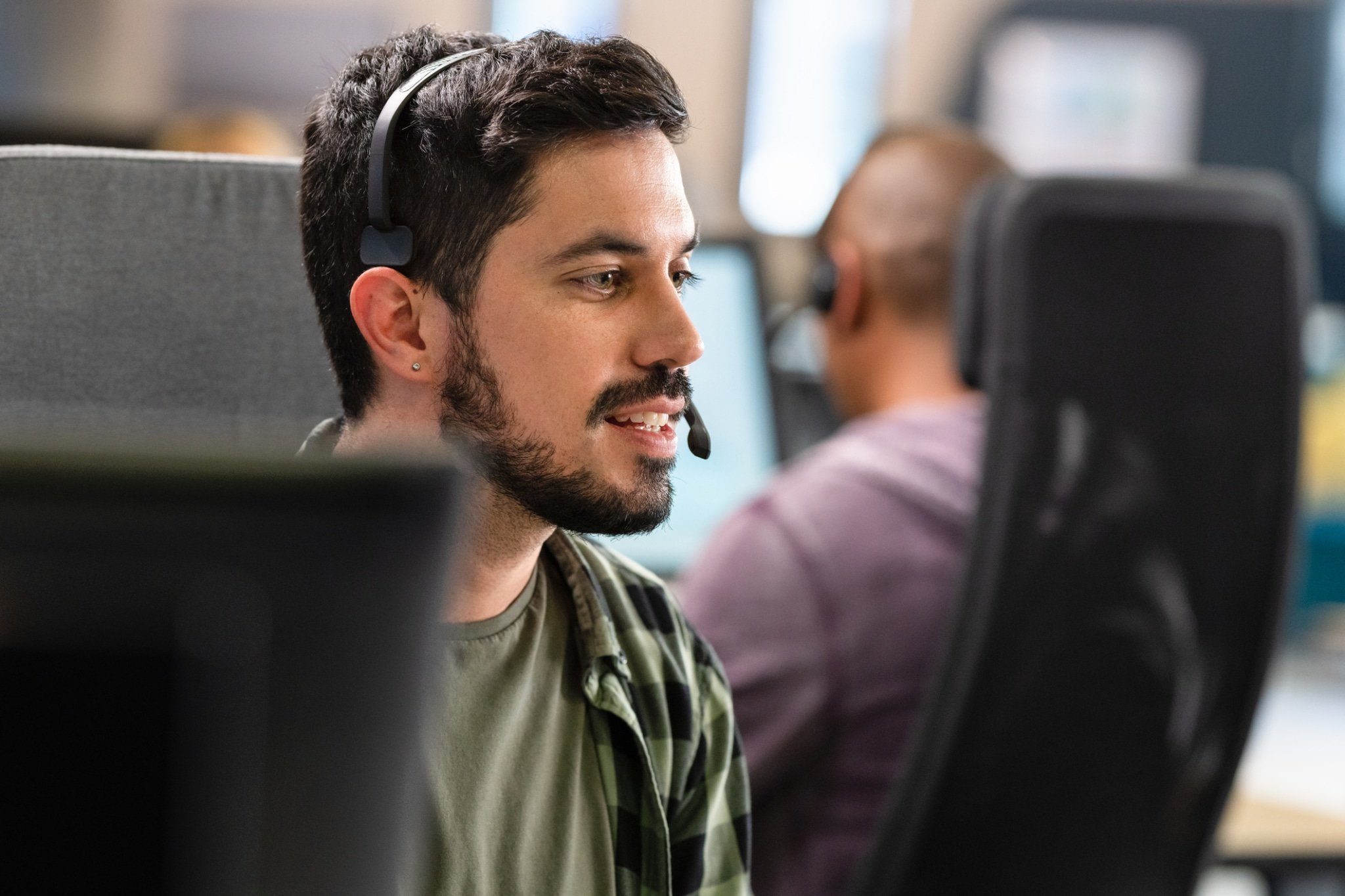 Man Talking To A Customer Over A Headset