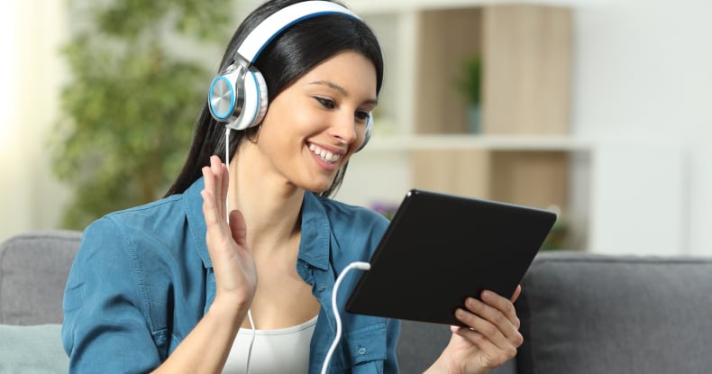 Woman having a video conferencing job interview on a tablet