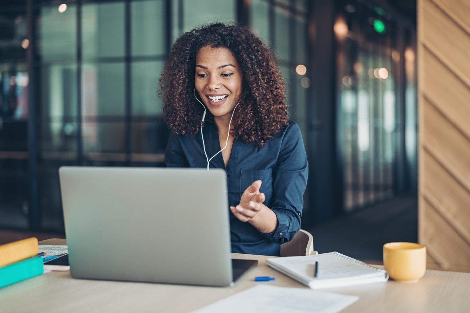 Smiling businesswoman during a video call in the office-724