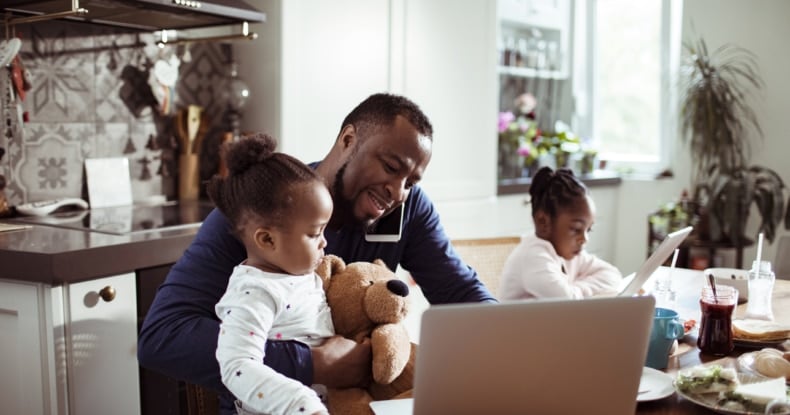 Young Family using a Laptop during Breakfast-882