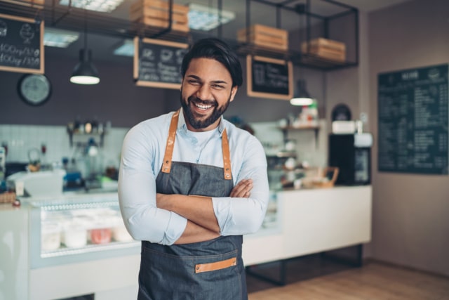 Happy coffee shop owner-642