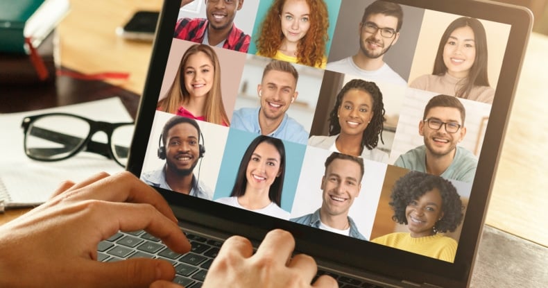 Unrecognizable Man Making Video Chat On Laptop With Diverse Multiethnic Colleagues-655