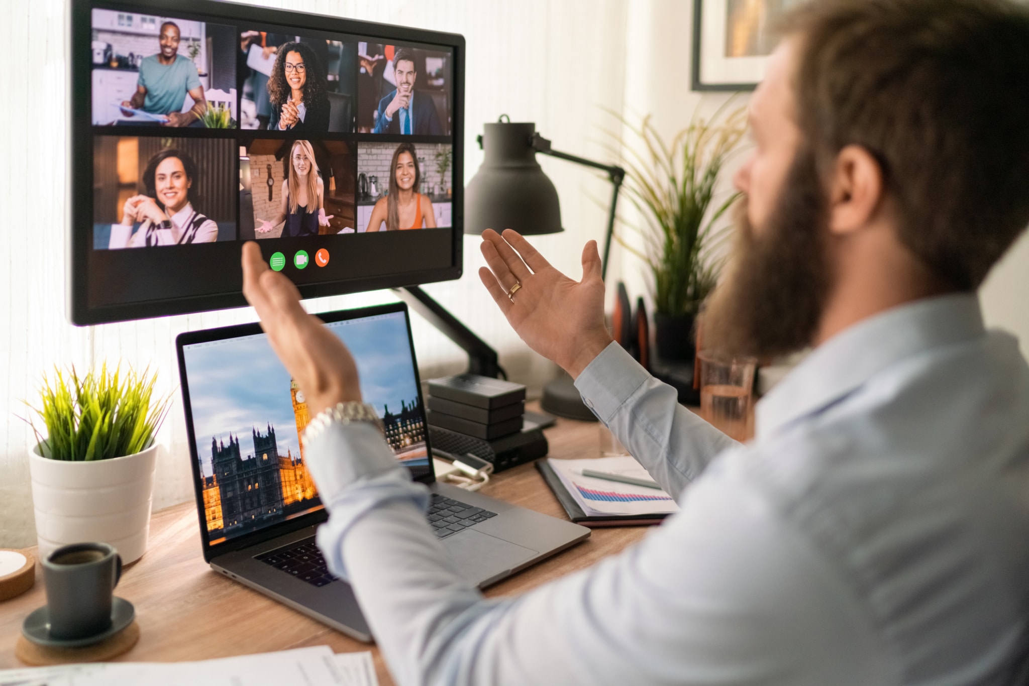 Business people talking on virtual staff meeting