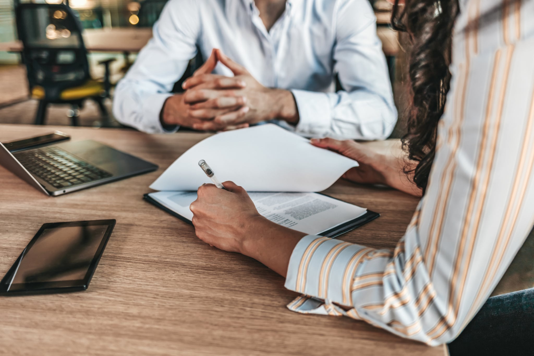 business people negotiating a contract