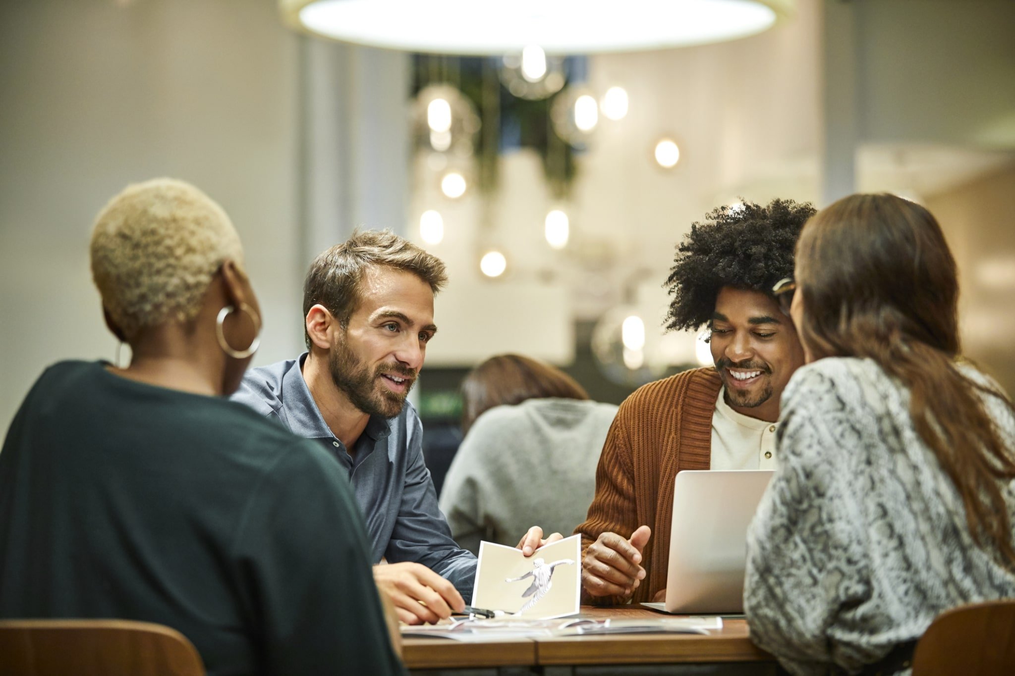 business professionals discussing at desk