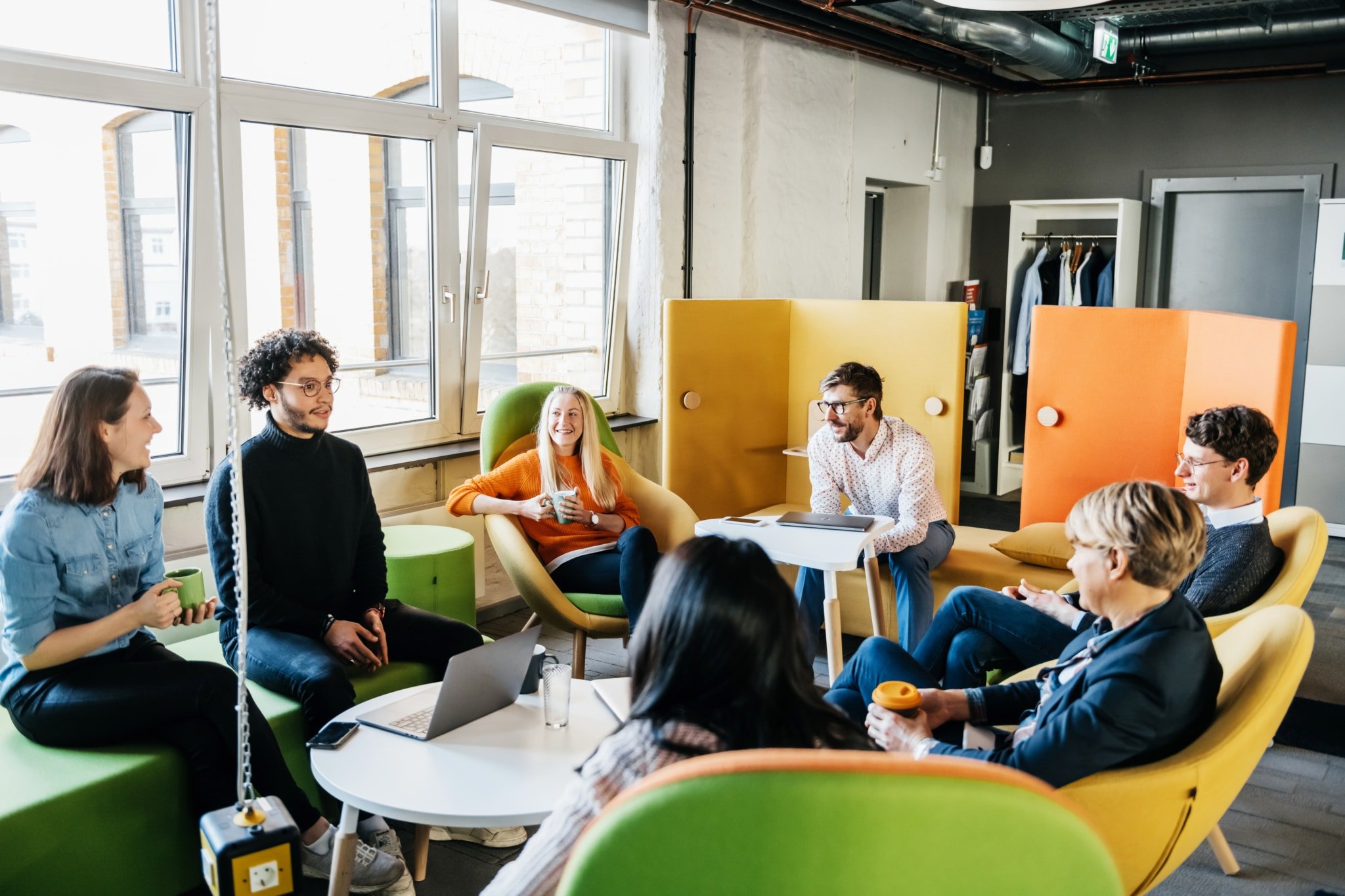 face to face meeting in a bright and modern office environment.