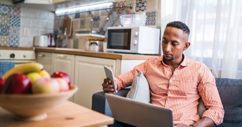 Young man working in his home office-784