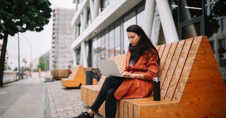 young woman working on the go in Berlin-951