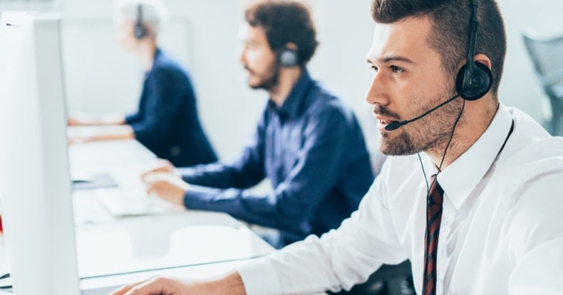 customer support operator with headset virtual call centre