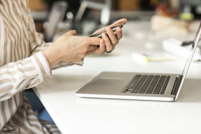 Businesswoman Using her Smartphone