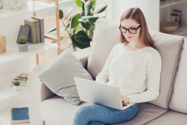 Woman browning on Google to find the right internet connection provider