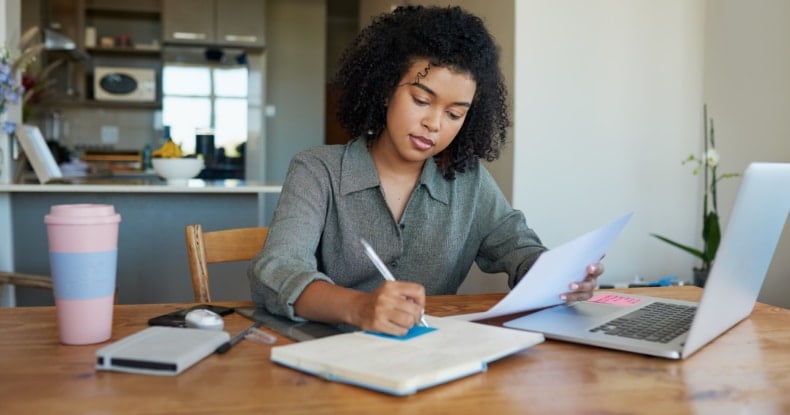 Woman working productively in teleworking mode