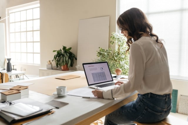 A woman working virtually from home