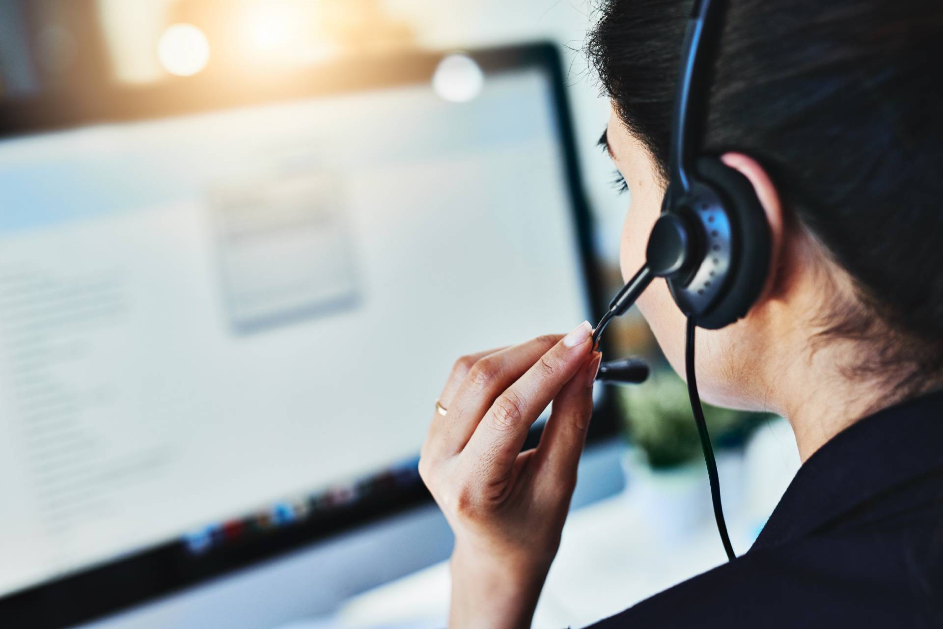 Call centre agent speaking with a customer