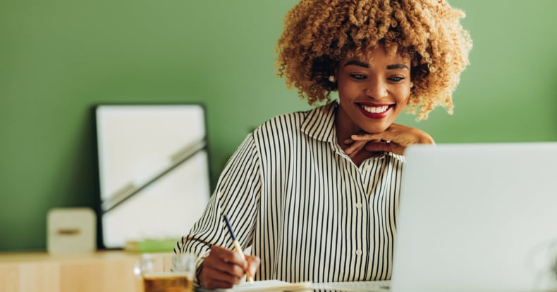 Happy Businesswoman Working at her Office-814