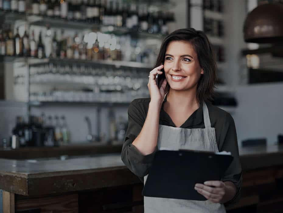 Employee discussing work tasks through phone using RingCentral app