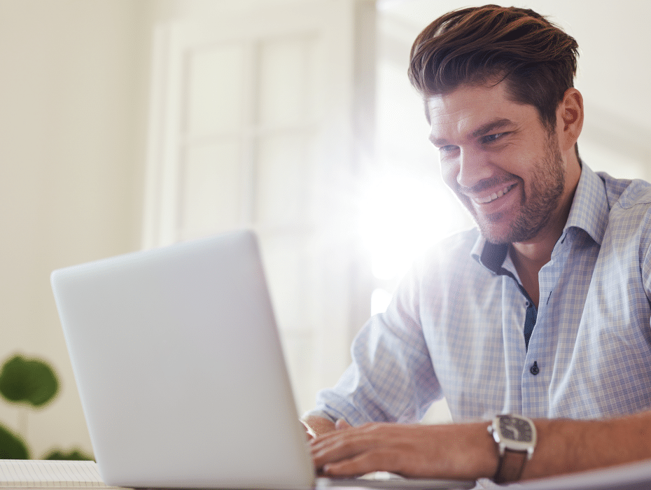 young-man-at-home-working-on-laptop-contact-centre-e1591104421810