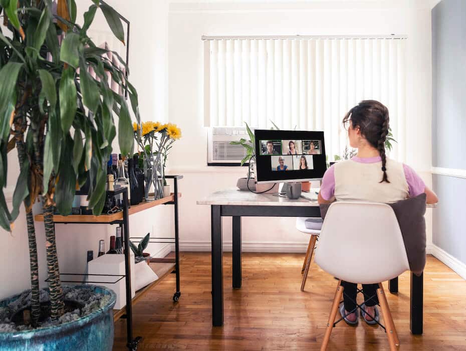 Work at home employee attending a productive team meeting using RingCentral video conferencing app