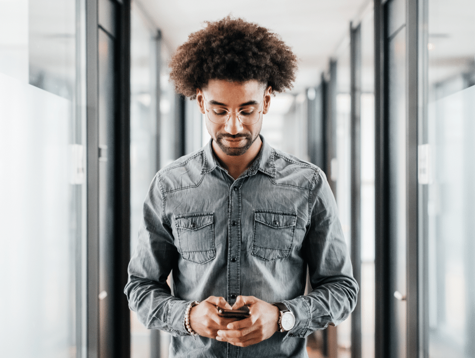 Person holding phone reading a report