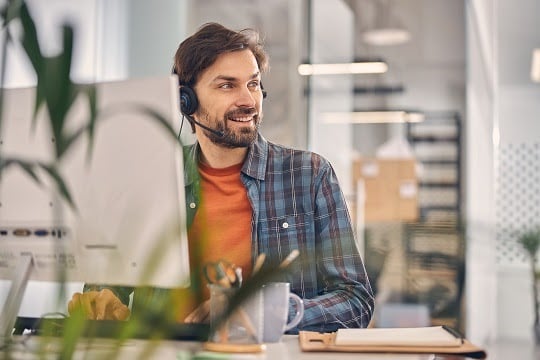 Call center representative at his desk