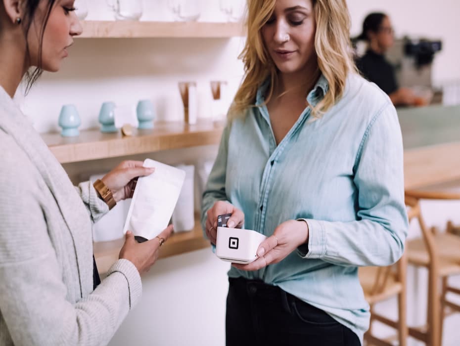 Woman purchasing item