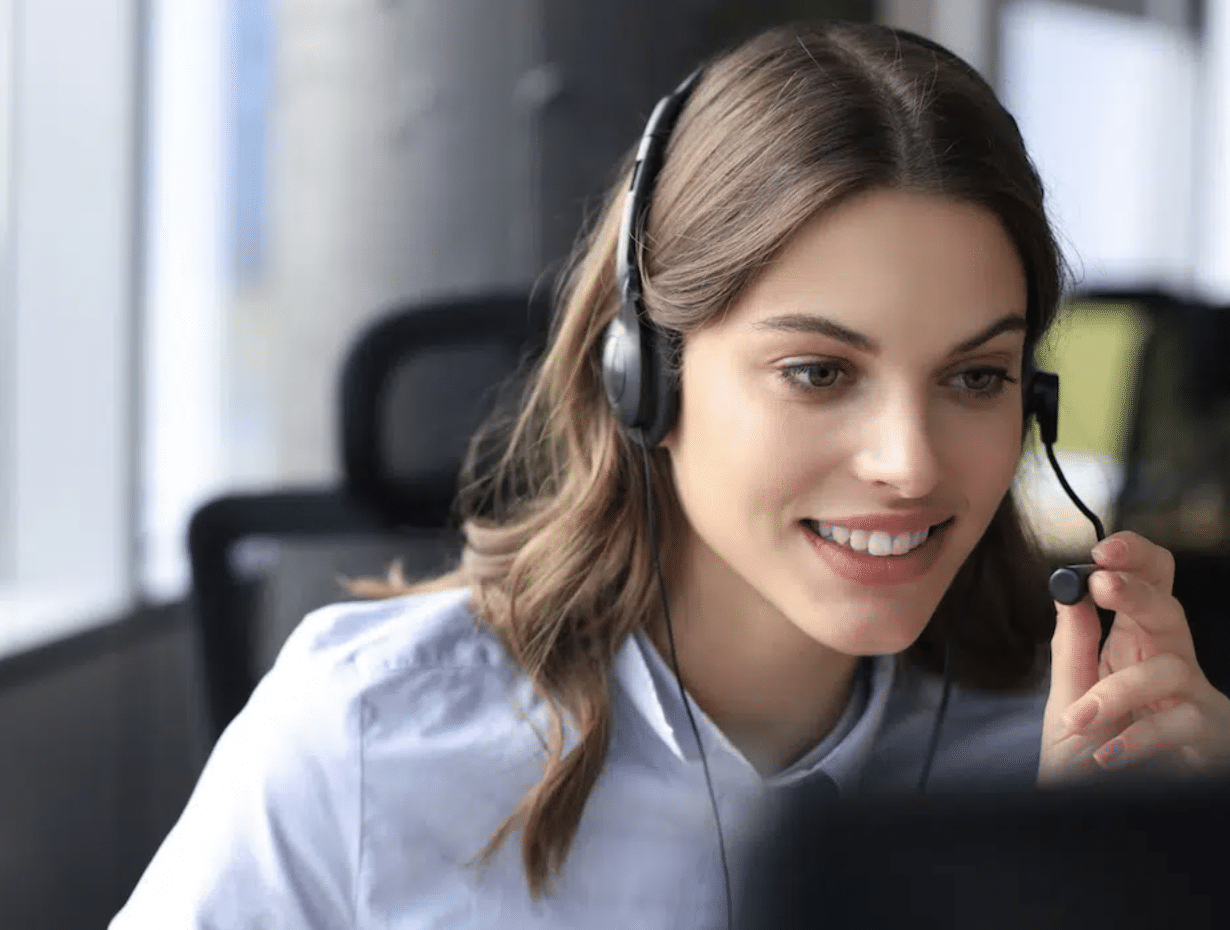 Smiling woman providing excellent customer experience at financial services organization