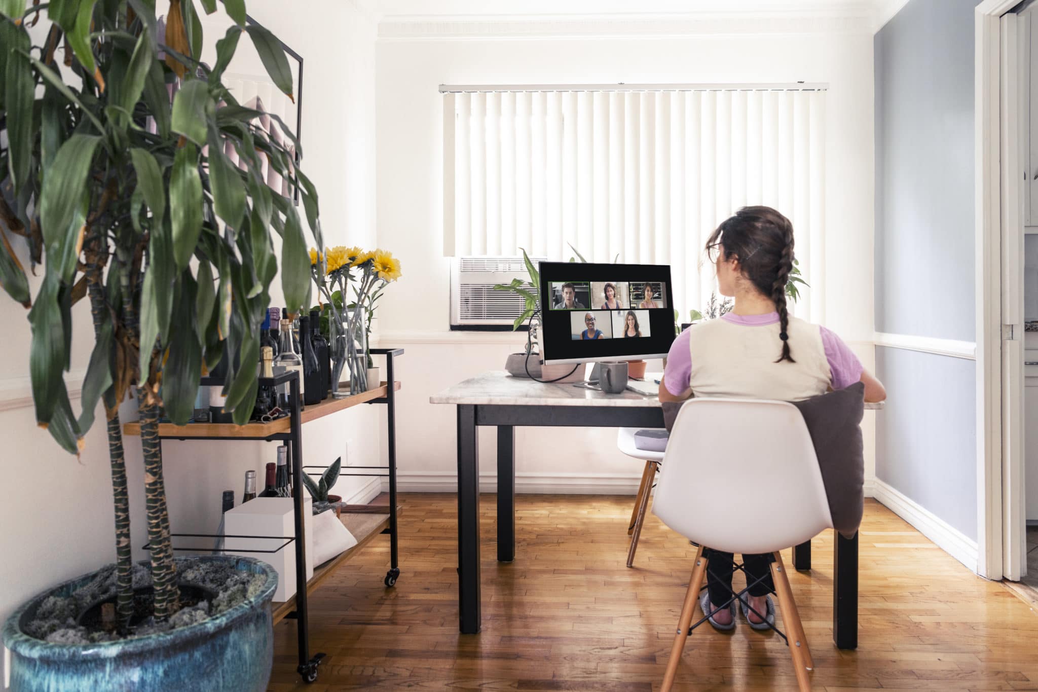 woman on video conference in her home