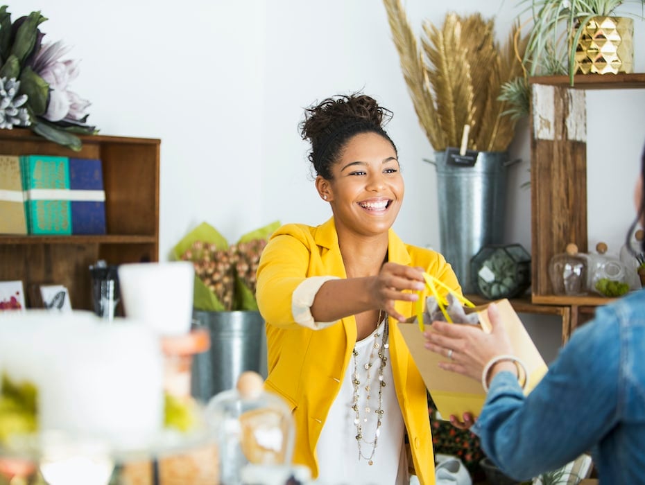 Employee helping customer. Customer happiness.