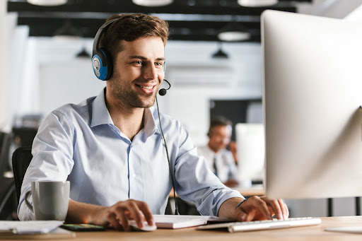 contact center at his desk