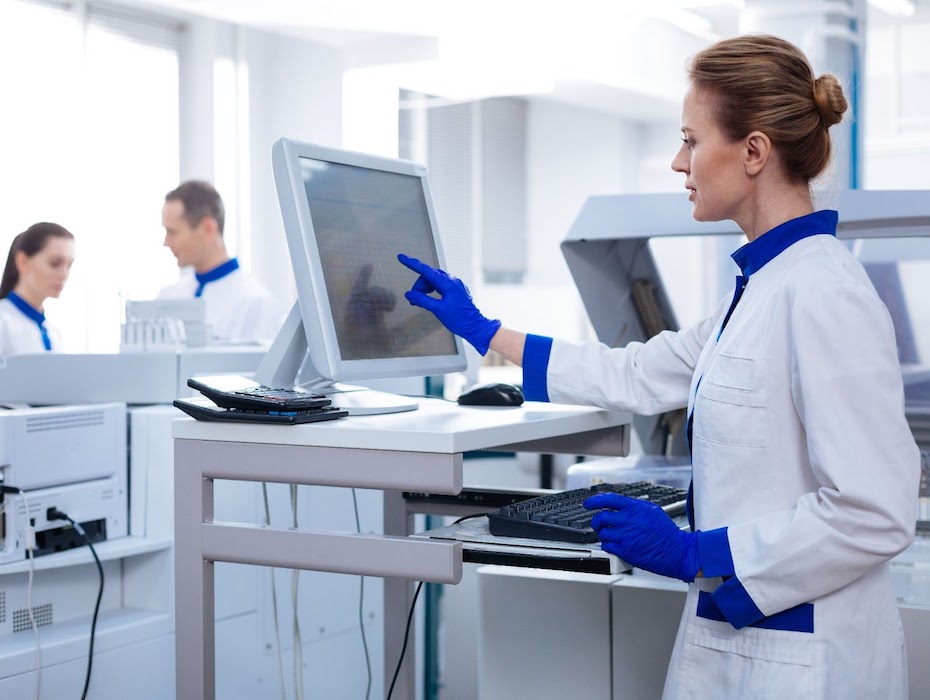 Life sciences professionals collaborating in an open room