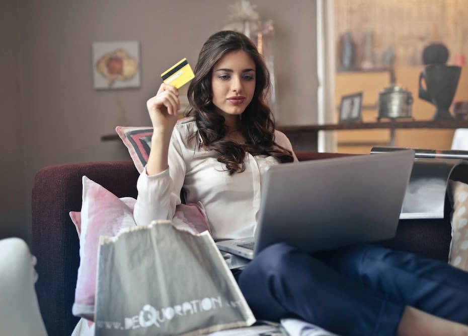 A woman online shopping using her laptop