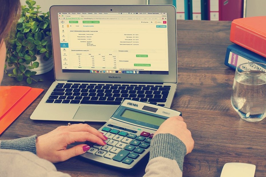 Financial services consumer sits in front of a laptop